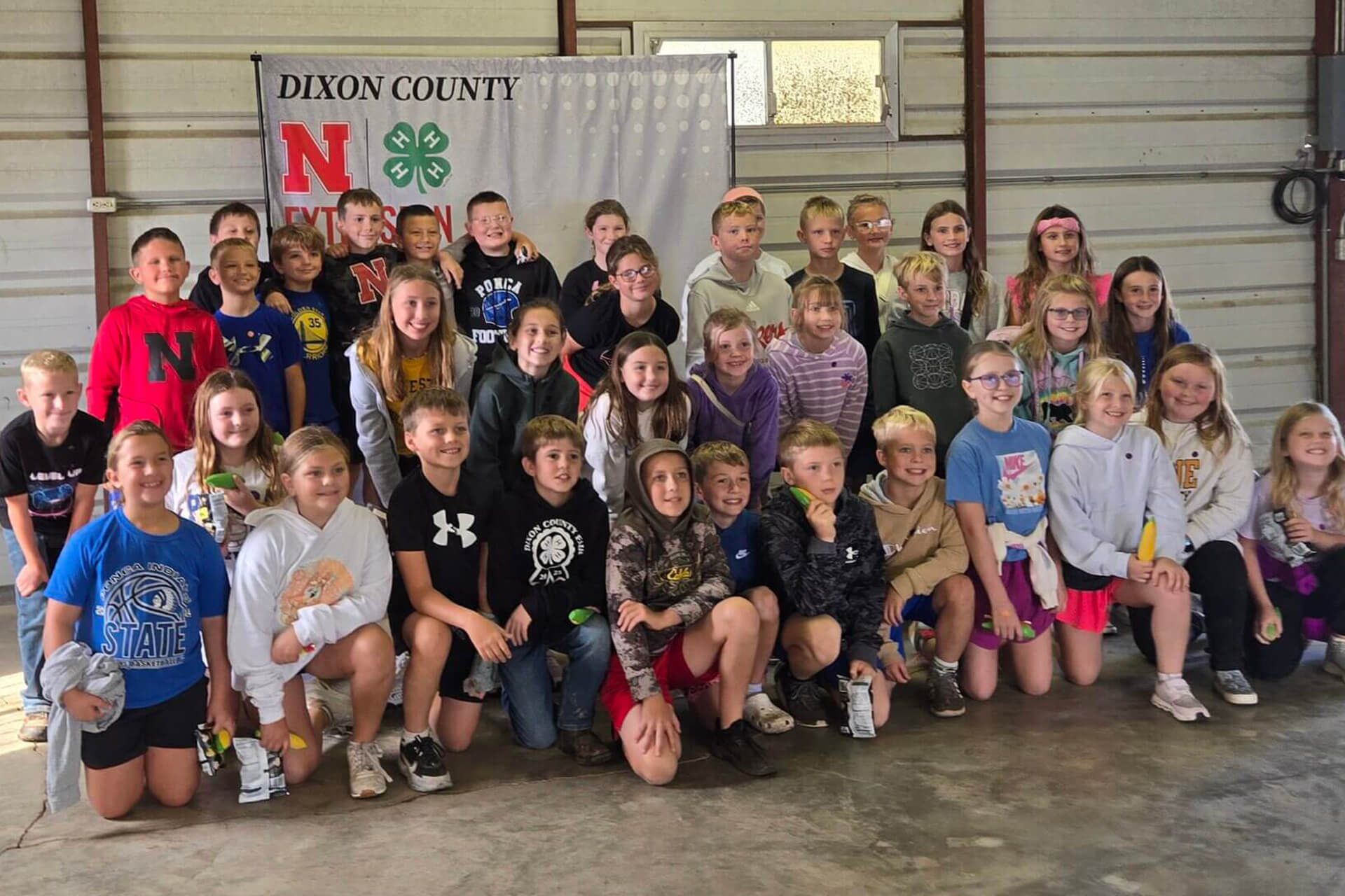The 2nd - 4th grad students posed for a group photo at the Ag Literacy Festival at Haskell Ag Lab