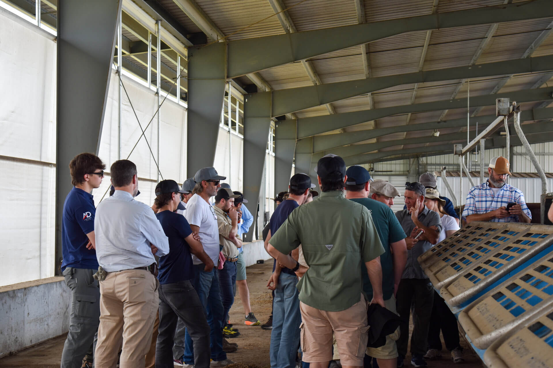 CREA group touring Klopfenstein feed tech barn  