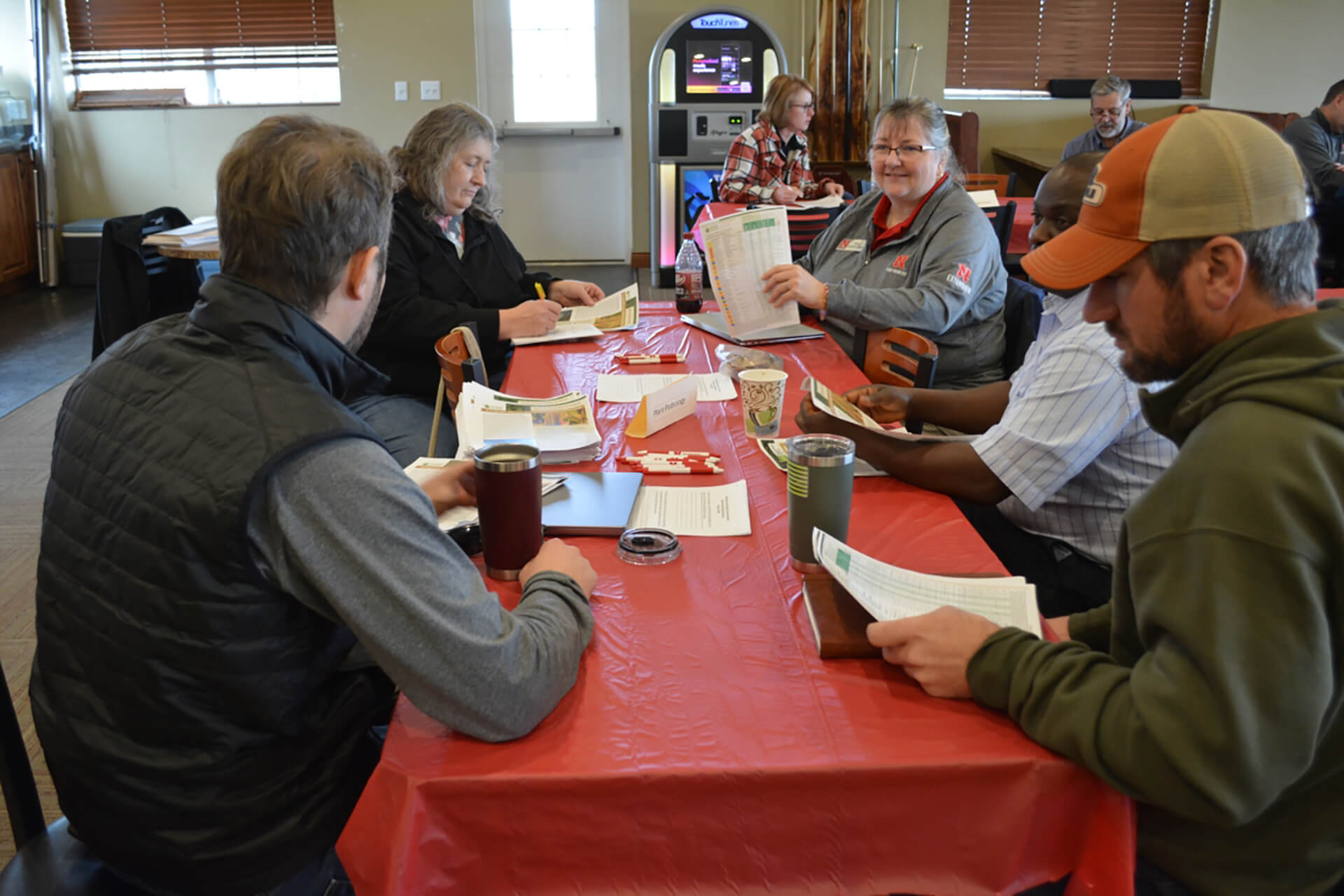A group of local producers meet with UNL Plant Pathologist Tamra Jackson-Ziems during the South Central Ag Lab Winter Data Sharing Workshop