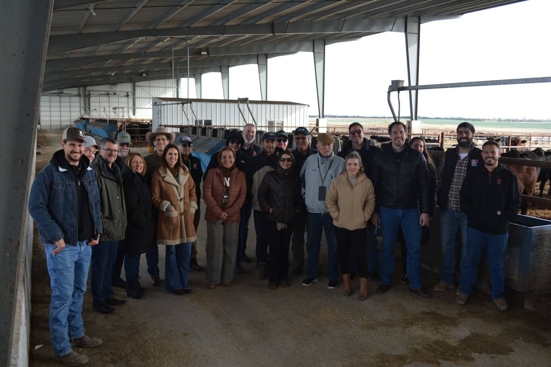 Beef Point mission Brazil group in feed tech barn 