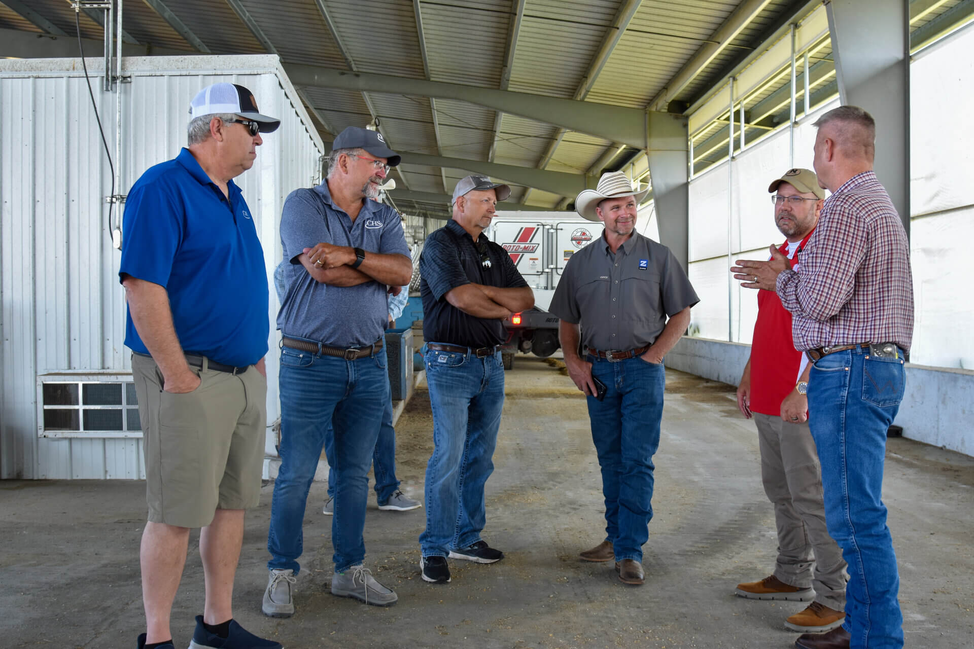 CHS ruminant nutritionist group tour in feed tech barn 