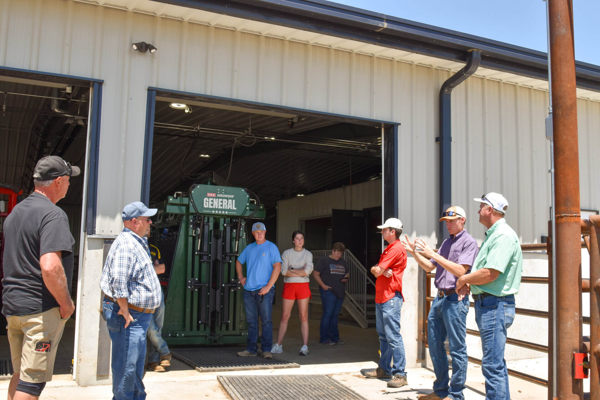 Cuming County cattle feeders touring cattle handling facility