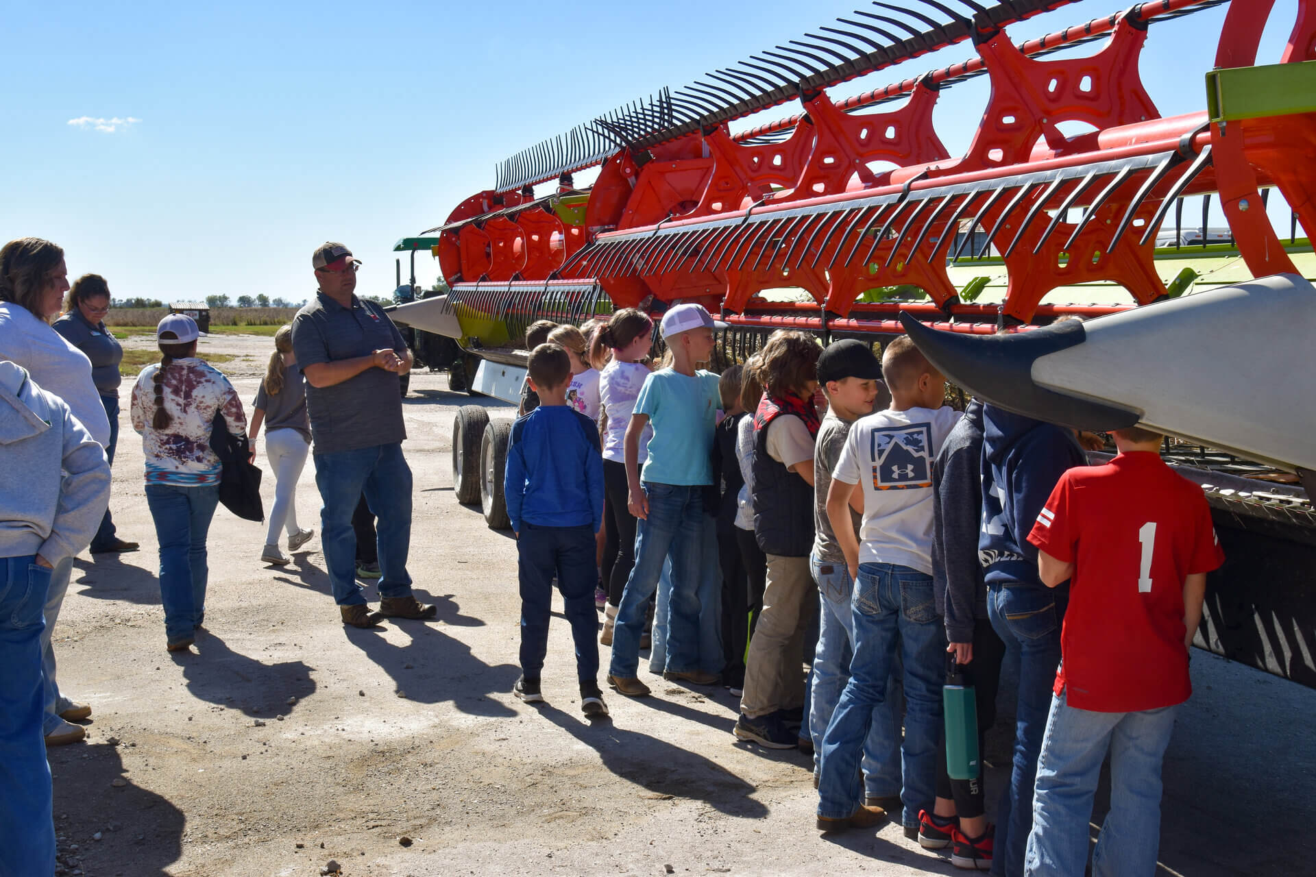 students looking at soybean head