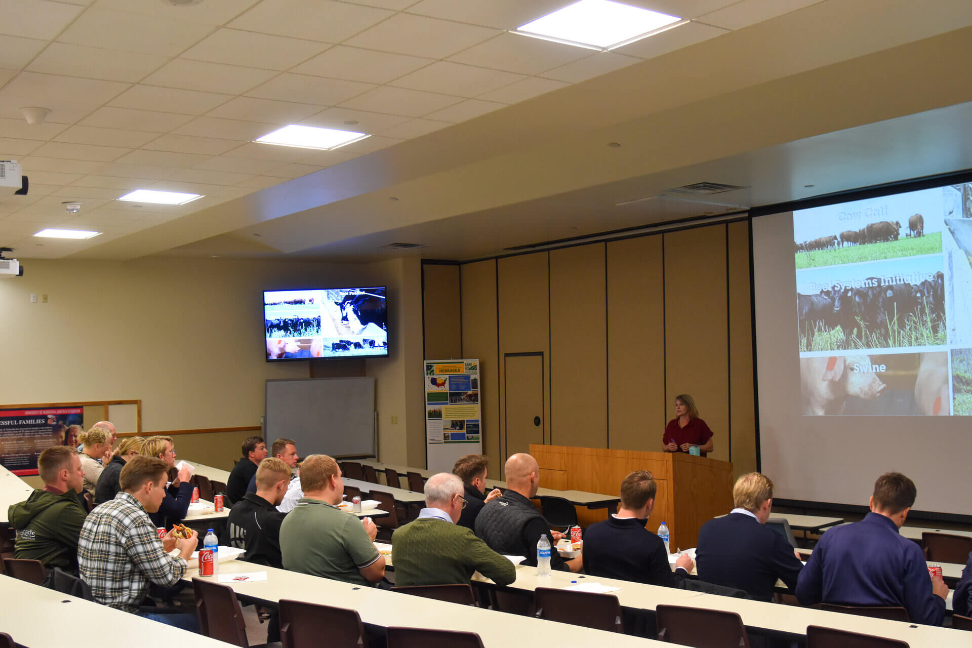Denmark delegates learn about ENREEC facility with welcome presentation in auditorium before tour