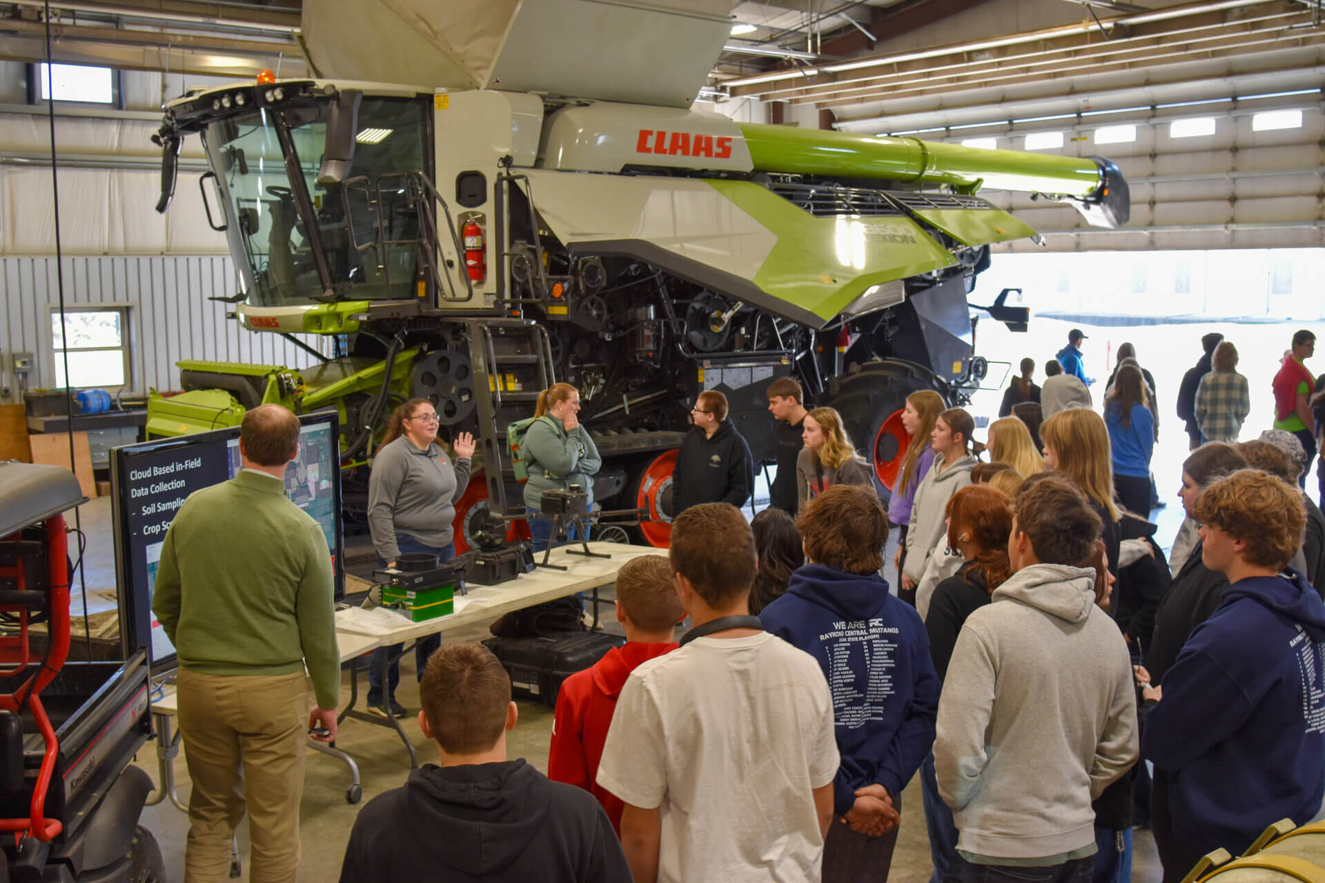 Raymond Central freshman in ENREEC farm shop learning about NFARMS ag technology and research 