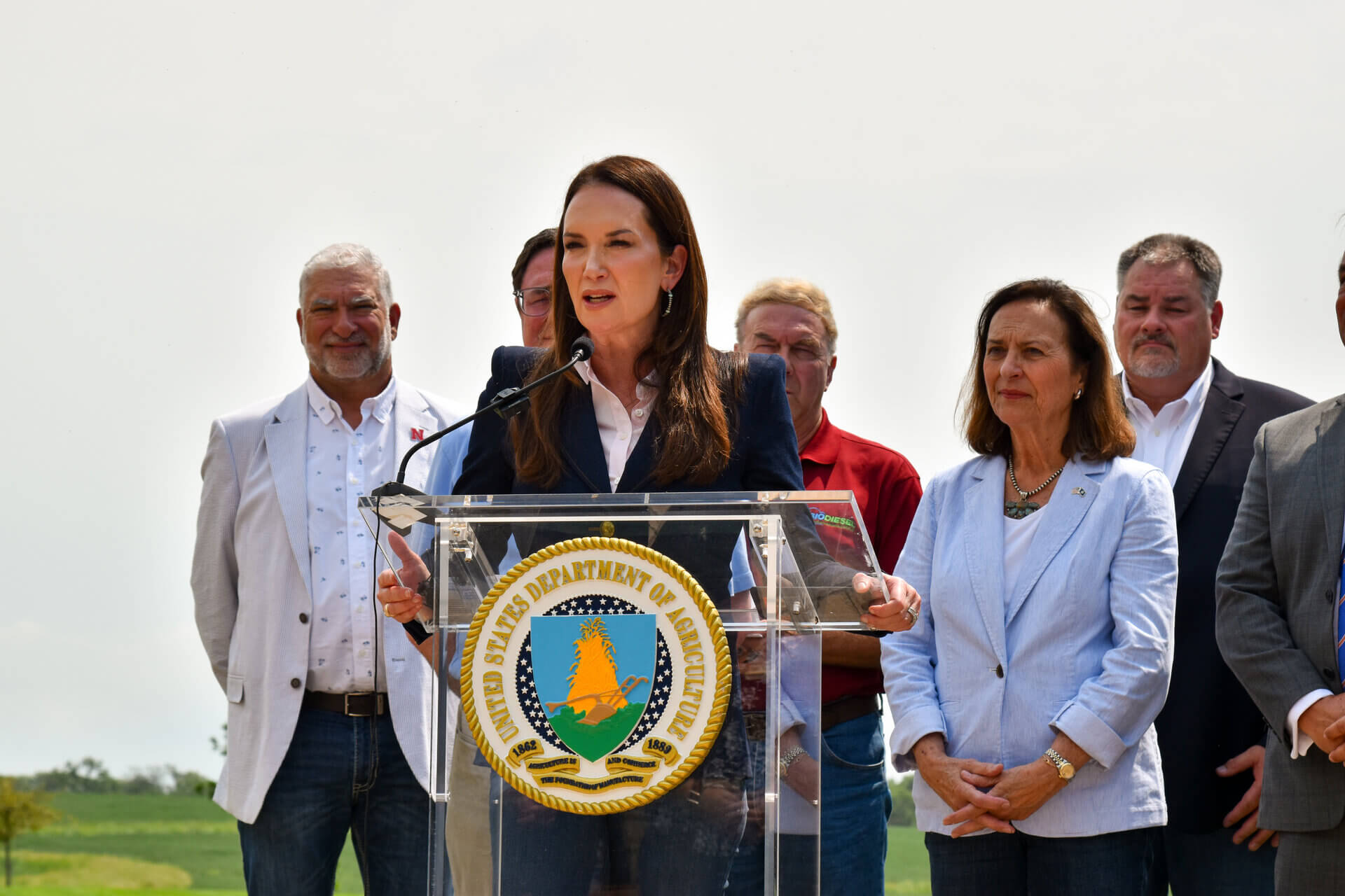 U.S. Secretary of Agriculture, Brooke Rollins holding a press conference on ENREEC patio with Nebraska government and ag association leadership presiding