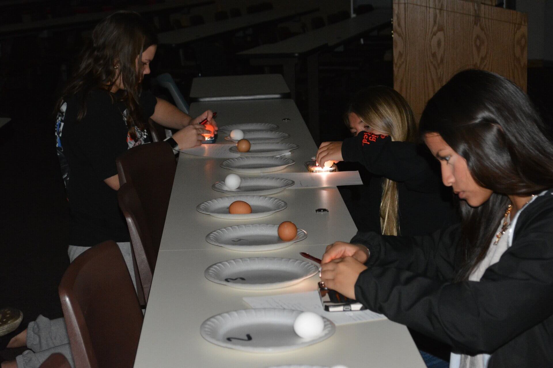 York FFA Chapter practiced poultry judging through candling eggs with Saunders County Extension and 4-H Educator Cole Meador before heading to the National FFA Convention.