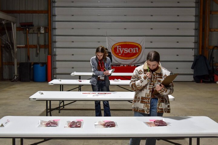 Students in a table session learning about careers at Haskell Ag Lab.