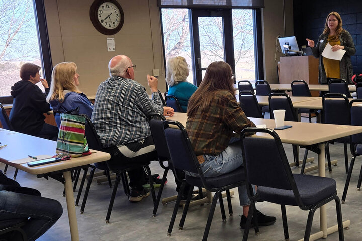 During a presentation, attendees learning how high nitrate levels in drinking water can affect their health.
